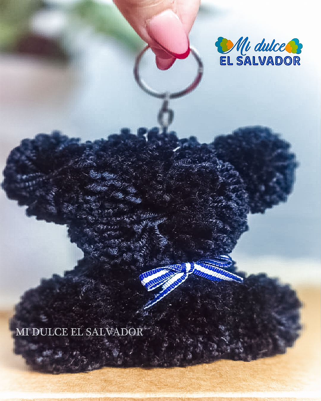 Bag charm osito pompón